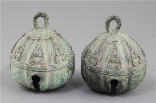 A pair of Chinese bronze bells, possibly Tang dynasty, 11.5cm